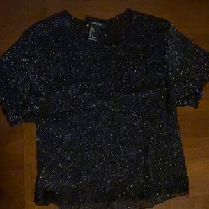 I’m selling a crop top brand is forever 21 size is small clot is black